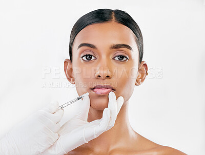Buy stock photo Lip filler, woman and face with beauty, cosmetic treatment and injection for skincare on white background. Portrait, dermatology and hands with needle, female model and procedure with liquid collagen