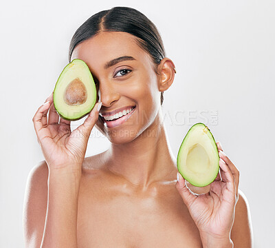 Buy stock photo Face, avocado and natural beauty, woman with organic cosmetics and facial on white background. Eco friendly skincare, healthy skin glow and female model in portrait, fruit and dermatology in studio