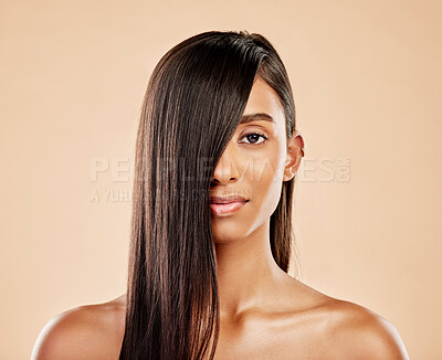 Buy stock photo Hair care, cosmetics and portrait of a woman on a studio background with salon treatment. Beauty, healthy and headshot of an Indian model or girl showing shampoo results isolated on a backdrop