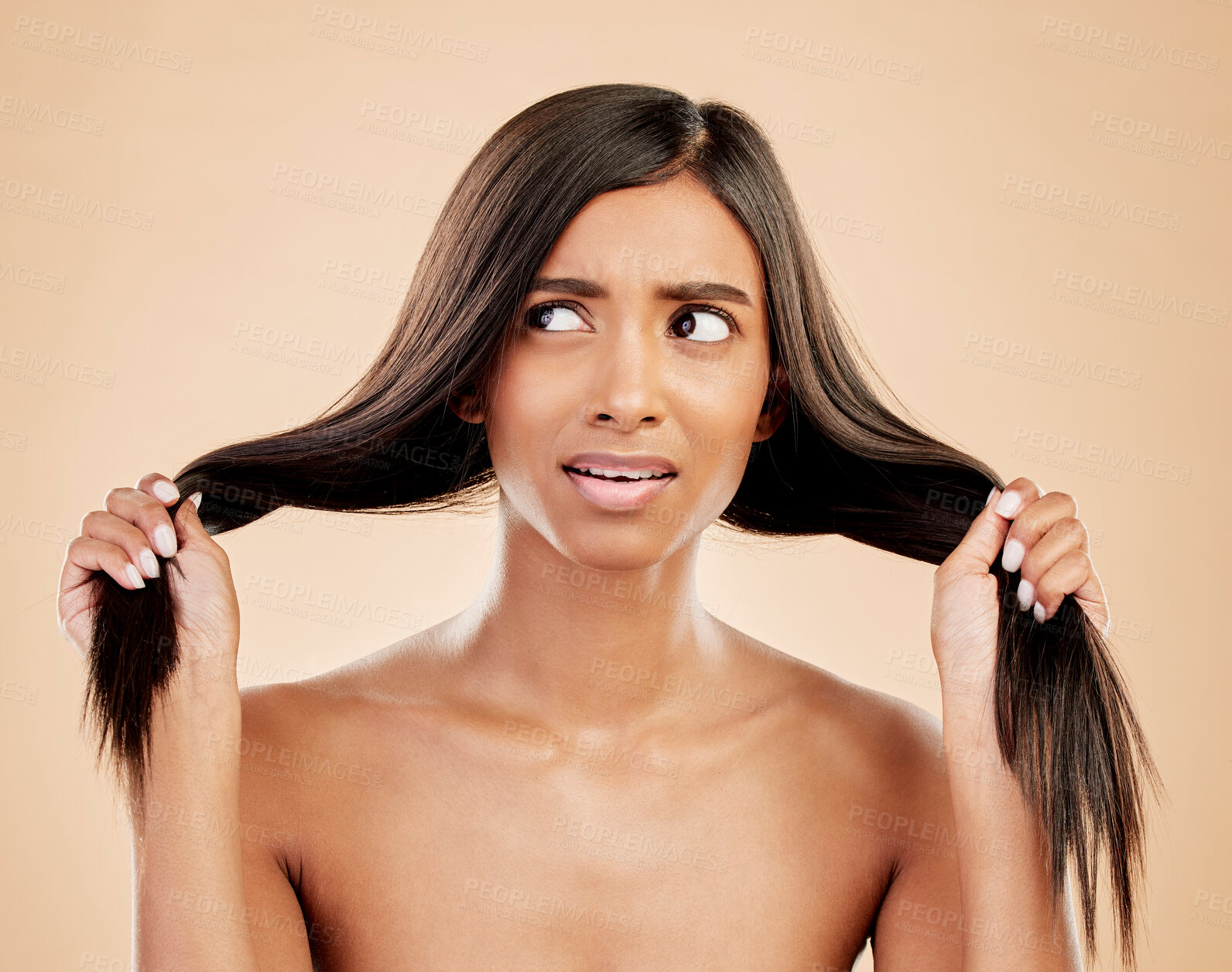 Buy stock photo Thinking, hair care and a woman with a problem on a studio background with anxiety and confused. Ideas, cosmetics and an Indian girl or model with hairstyle stress or fail isolated on a backdrop 