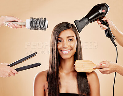Buy stock photo Hair, electric tools and portrait of woman for beauty options on studio background. Happy indian female model with choice of aesthetic salon equipment with brush, hairdryer and flat iron for makeover