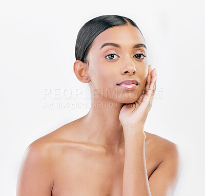 Buy stock photo Beauty, hand on face and portrait a woman with natural skincare isolated on a white background. Dermatology, makeup glow and cosmetics with Indian female model for facial shine or self care in studio