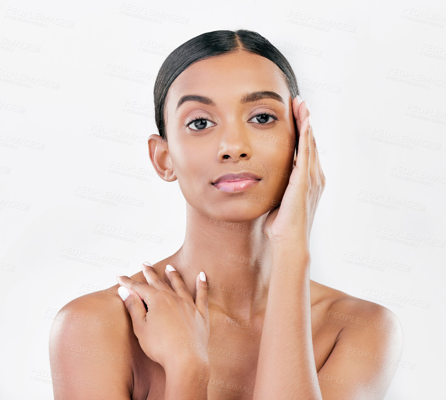 Buy stock photo Beauty, natural and face portrait of a woman with a skincare glow isolated on a white background. Dermatology, makeup and cosmetics of Indian person for facial shine, touch or self care in studio