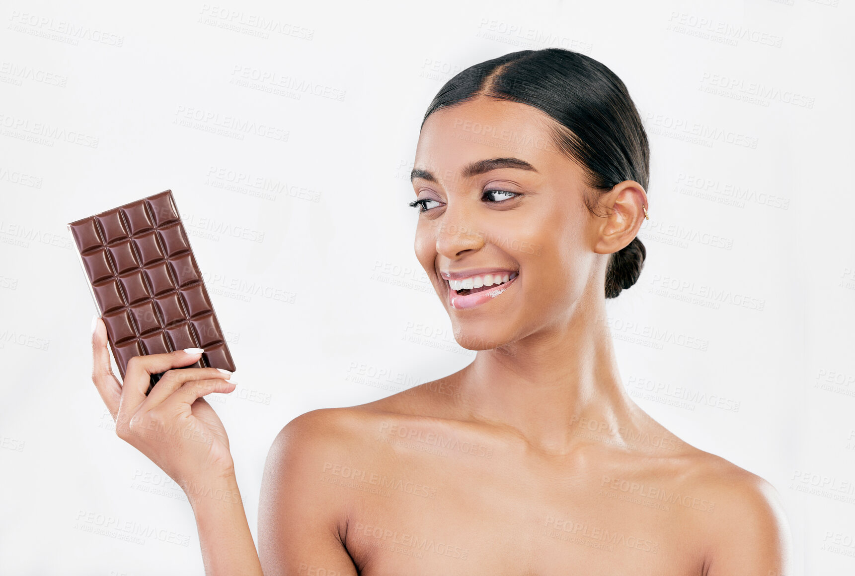 Buy stock photo Happy woman, chocolate and sweet candy for diet or unhealthy food against a white studio background. Female person or model with cocoa slab, block or bar for delicious snack or diabetes on mockup