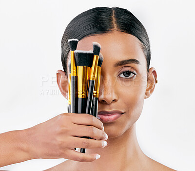 Buy stock photo Portrait, skincare and woman with makeup, brushes and organic facial against a white studio background. Face, female person and model with cosmetics tools, natural beauty and luxury with wellness