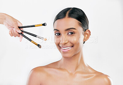 Buy stock photo Portrait, skincare and woman with makeup, brushes and dermatology against a white studio background. Face, female person or model with cosmetics tools, shine or luxury with wellness, facial or health