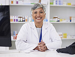 Portrait, pharmacist and smile with technology for communication at chemist for medicine. Mature female, pharmacy and face with smile for medicine with customer service in retail healthcare. 
