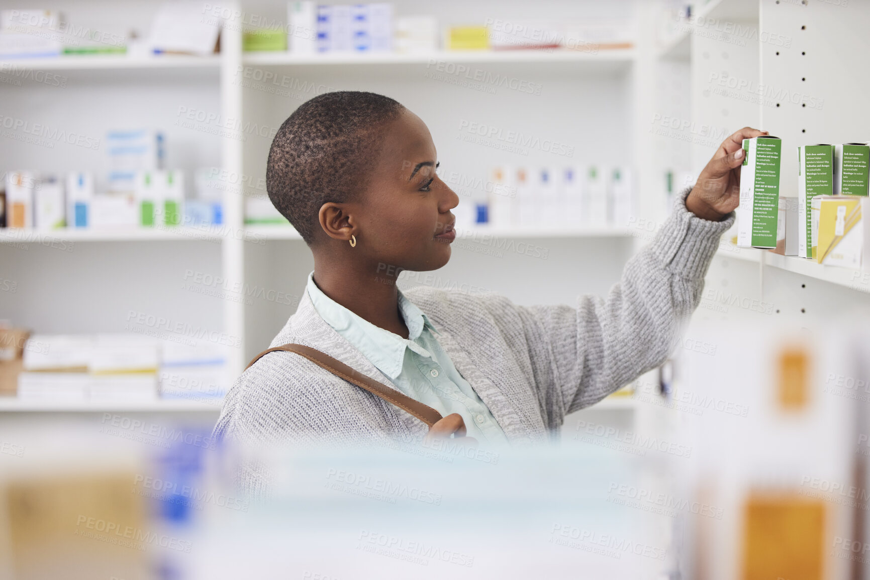 Buy stock photo Medicine, shelf and shopping with black woman in pharmacy for medical, pills and information. Healthcare, product and retail with female customer and box for inventory, wellness and supplements
