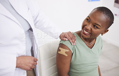 Buy stock photo Doctor, patient and plaster on arm for vaccine, medicine and protection for virus with happy black woman in clinic. Medic, african girl and smile for helping hand, injection and strong immune system