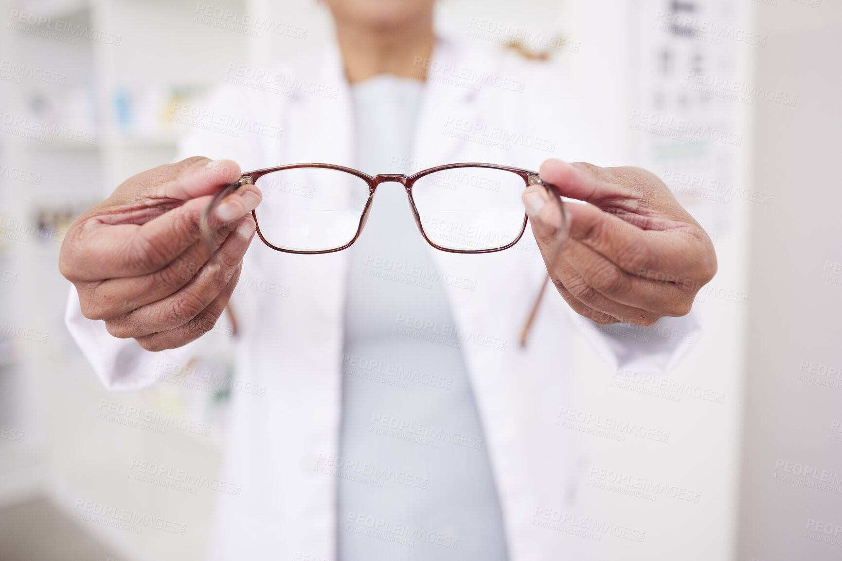 Buy stock photo Glasses in hands, vision and eye care, health with eyesight test and optometry, prescription lens and designer frame. Ophthalmology, focus and healthcare, person in optometrist clinic and eyewear
