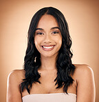 Portrait, hair and salon with a model woman in studio on a brown background for shampoo treatment. Smile, beauty and haircare with a happy young person looking confident about natural cosmetics