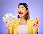 Money, phone and woman with wow for winning, finance or online savings, profit and cash prize. Success, lottery and winner or asian person on mobile, money fan and banking on studio purple background
