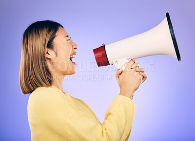 Buy stock photo Megaphone, voice and young woman with human rights, equality and freedom of speech or strong opinion. Person protest, call to action and change or justice with noise on studio or purple background