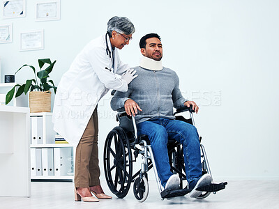 Hospital, injury and doctor with man in wheelchair for medical emergency, accident and surgery. Healthcare, clinic and female health worker with male patient for help, support and rehabilitation