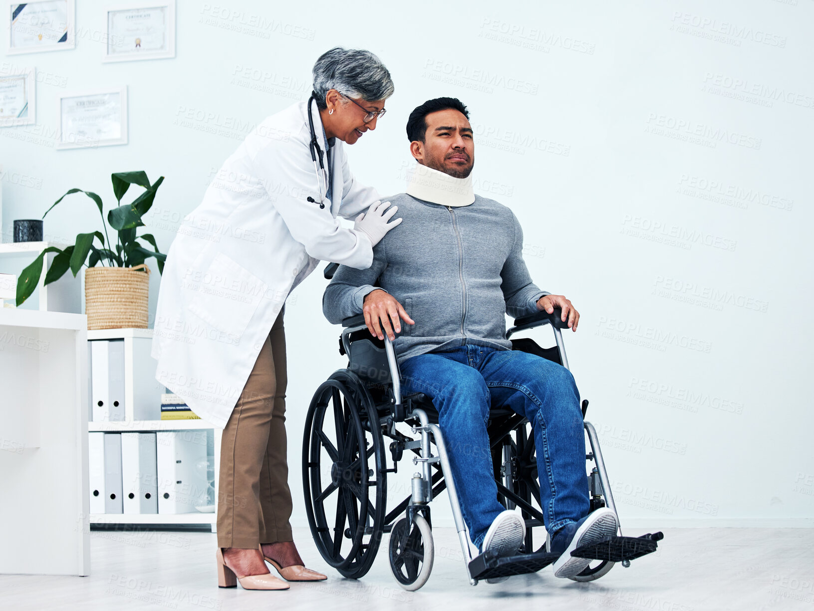 Buy stock photo Hospital, injury and doctor with man in wheelchair for medical emergency, accident and surgery. Healthcare, clinic and health worker with patient with disability for help, support and rehabilitation
