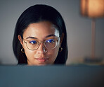 Glasses, focus and woman journalist writing on a computer, online and social media news update or a serious blog. Face, internet and remote work for an employee working on a project or proposal