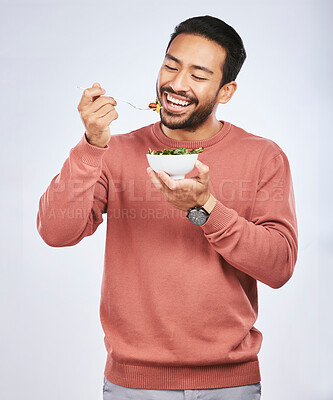 Buy stock photo Health studio, happy man and eating salad, vegetables or green food meal for diet, healthy lunch or wellness  nutrition. Nutritionist, lettuce bowl and hungry male vegetarian on white background