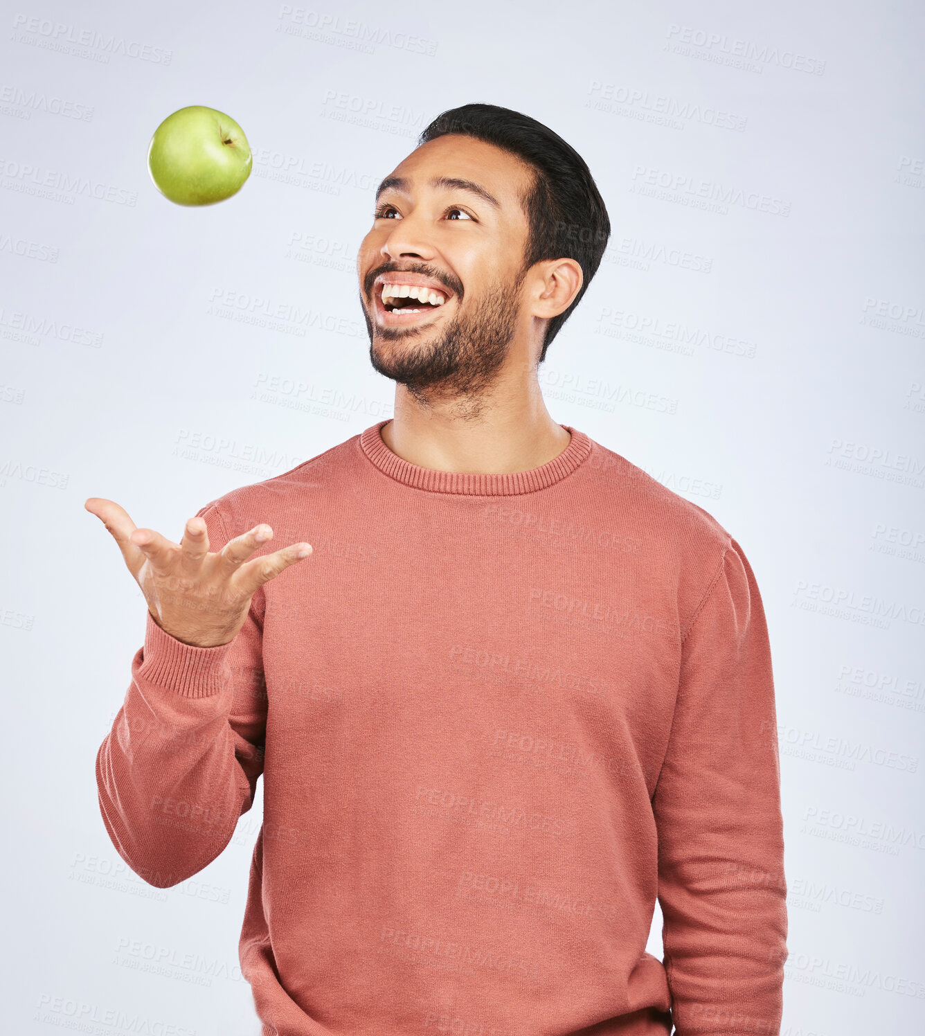 Buy stock photo Health studio, throw and happy man with apple product for weight loss diet, healthy food or nutrition meal, vitamin or fiber. Wellness, nutritionist fruit or hungry person excited on white background