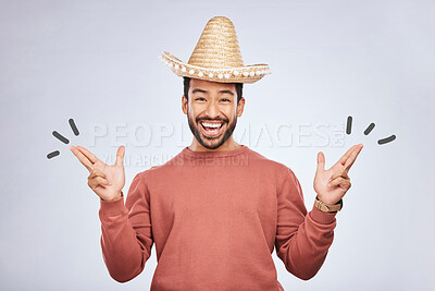 Buy stock photo Finger gun, hat and portrait of man in studio with hand gesture for comic, humor and funny joke. Happy, Mexican party accessories and excited male person on gray background with sombrero for comedy