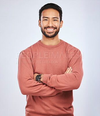 Buy stock photo Portrait, happy or confident Asian man with arms crossed or smile in studio in casual fashion or clothes. Relax, satisfied or friendly handsome person smiling on white background with pride or joy 