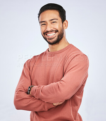 Buy stock photo Portrait, smile and Asian man with arms crossed, casual fashion and confident guy against a white studio background. Face, male person and Japanese model with happiness, aesthetic and stylish outfit