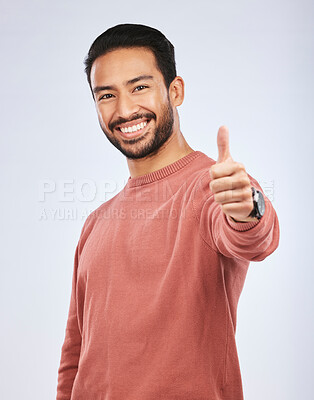 Buy stock photo Thumbs up, portrait and man vote for success in studio, white background and thank you. Happy asian male model, thumb emoji and support of winning, like and motivation of feedback, good review or yes