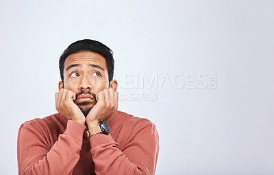 Buy stock photo Depression, thinking and sad asian man in studio for stress or broken heart, lonely or bored on grey background. Doubt, fear and face of male with anxiety, grief or trauma and mental health crisis