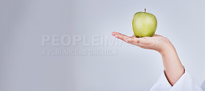 Buy stock photo Mockup apple, hand and banner for diet marketing, health promotion or advertising nutrition. Space, wellness and person with a fruit or food for detox or vegan balance isolated on a white background