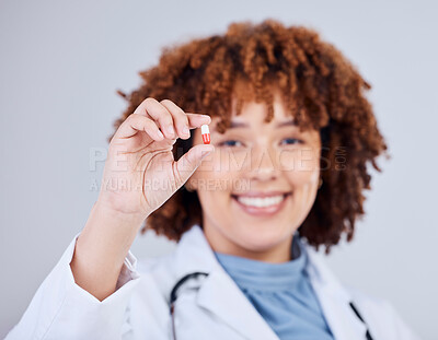 Buy stock photo Medicine, pills and doctor with portrait of woman in studio for prescription, supplements or medical. Healthcare, pharmacy and product with female pharmacist on white background for wellness and cure