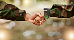 Army, camouflage and handshake for peace deal, problem solving and support for world solidarity. Partnership, connection and military people shaking hands in trust, agreement or mission cooperation.