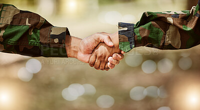 Buy stock photo Army, camouflage and handshake for peace deal, problem solving and support for world solidarity. Partnership, connection and military people shaking hands in trust, agreement or mission cooperation.