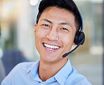 Portrait, smile and an asian man in a call center for customer service, support or lead generation. Face, contact and headset with a happy young male consultant working in an office for assistance