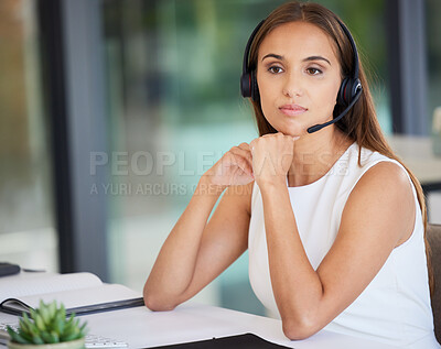 Buy stock photo Call center, serious woman and thinking in office of customer service, CRM solution and telecom ideas. Female agent focus with microphone for telemarketing, sales consulting and support at help desk