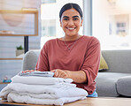 Cleaning, happy and laundry with portrait of woman in living room for housekeeping service, clothes and fabric. Hospitality, smile and cleaner with person at home for maintenance and washing