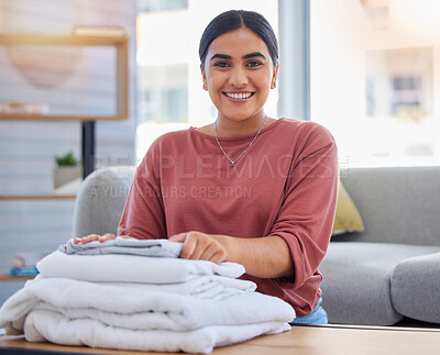 Buy stock photo Cleaning, happy and laundry with portrait of woman in living room for housekeeping service, clothes and fabric. Hospitality, smile and cleaner with person at home for maintenance and washing
