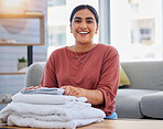 Cleaning, smile and laundry with portrait of woman in living room for housekeeping service, clothes and fabric. Hospitality, happy and cleaner with person at home for maintenance and washing