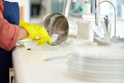 Buy stock photo Hands of woman, gloves and washing dishes in kitchen, brush chores and house work, cleaner service and home care. Cleaning, soap and water, housekeeper working in apartment with dirt and foam at sink