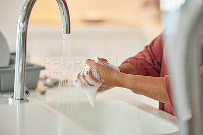Buy stock photo Washing hands, cleaning and person with hygiene and water for wellness in a kitchen faucet. Soap foam, sink and home with bacteria prevention and safety with disinfection with liquid before cooking