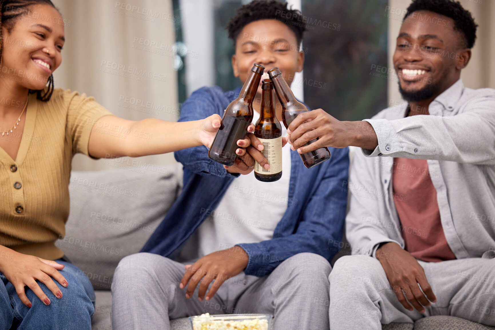 Buy stock photo Black people, friends and beer in cheers on sofa for celebration, friendship or social gathering at home. Happy African group in relax, toast or enjoying alcohol, memory or event for entertainment
