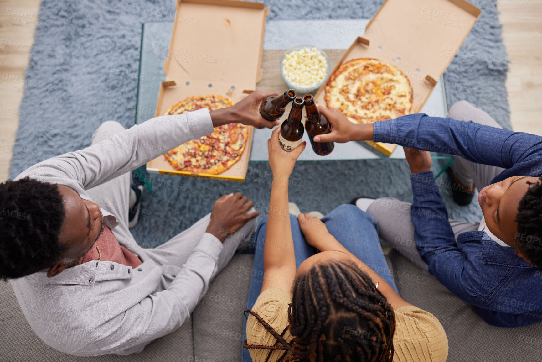 Buy stock photo Cheers, beer and above of people with pizza, lunch celebration and relax together in a house. Happy, dinner and friends toasting with alcohol and food on the living room sofa to celebrate eating