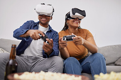 Buy stock photo Happy, playing and a couple with vr games, metaverse glasses and digital competition on the sofa. Smile, home and a black man and woman with future technology for a gaming experience on the couch