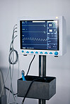 Medical monitor, heart machine and healthcare, cardiology and equipment with stats and vitals in hospital. Medicine, health information and wellness, digital and screen with EKG and ECG in clinic