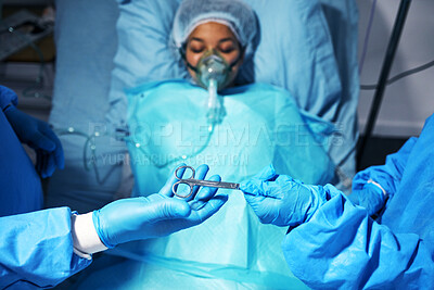 Buy stock photo Hands, scissors and surgery with a team of doctors operating on a patient in the hospital emergency room. Medical, equipment or operation with medicine professionals in a clinic theatre from above