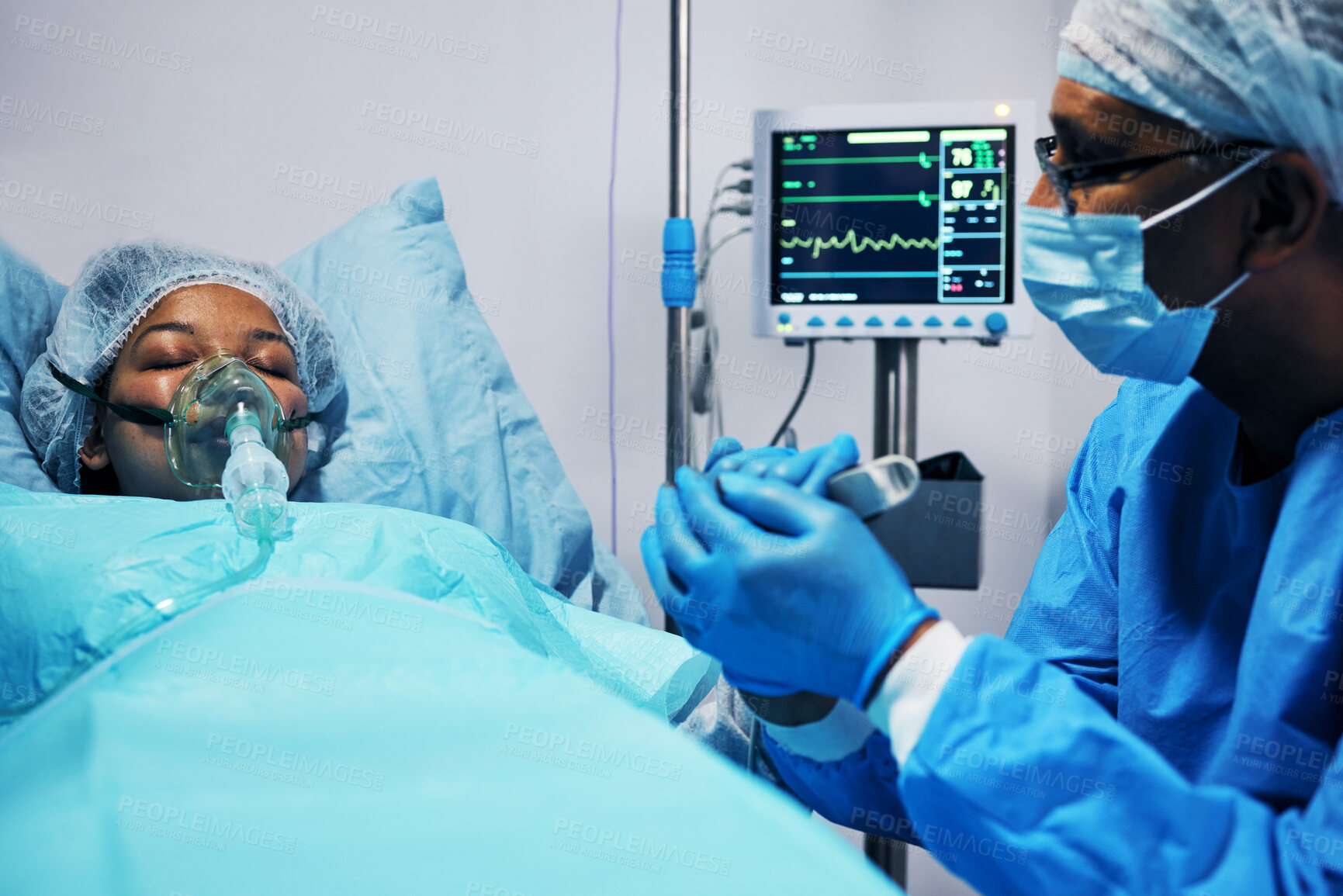 Buy stock photo Healthcare, doctor and patient holding hands in hope after surgery, emergency care and hospital bed. Breathing, monitor and air, surgeon with helping hand in operation, support for medical results.