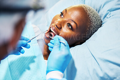Buy stock photo Dentist, inspection and woman with tools in mouth at clinic for cavity, teeth whitening and helping hand for pain. Dental surgeon, African patient and mirror for exam, care or check for healthy smile