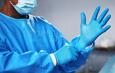 Buy stock photo Doctor with gloves, health and surgeon with PPE, safety and protection from bacteria, operating room and closeup. Medical professional, surgery and treatment with person in hospital and healthcare