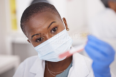 Buy stock photo Black woman, face and mask for blood test, science and innovation in vaccine, research or working with virus dna sample. Tube, container and hand of scientist or medical expert with biotechnology
