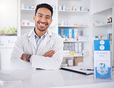 Buy stock photo Asian man, portrait and pharmacist with arms crossed in pharmacy, drugstore or shop. Face, confidence or medical professional, happy doctor or worker with a pharmaceutical job for healthcare in Japan