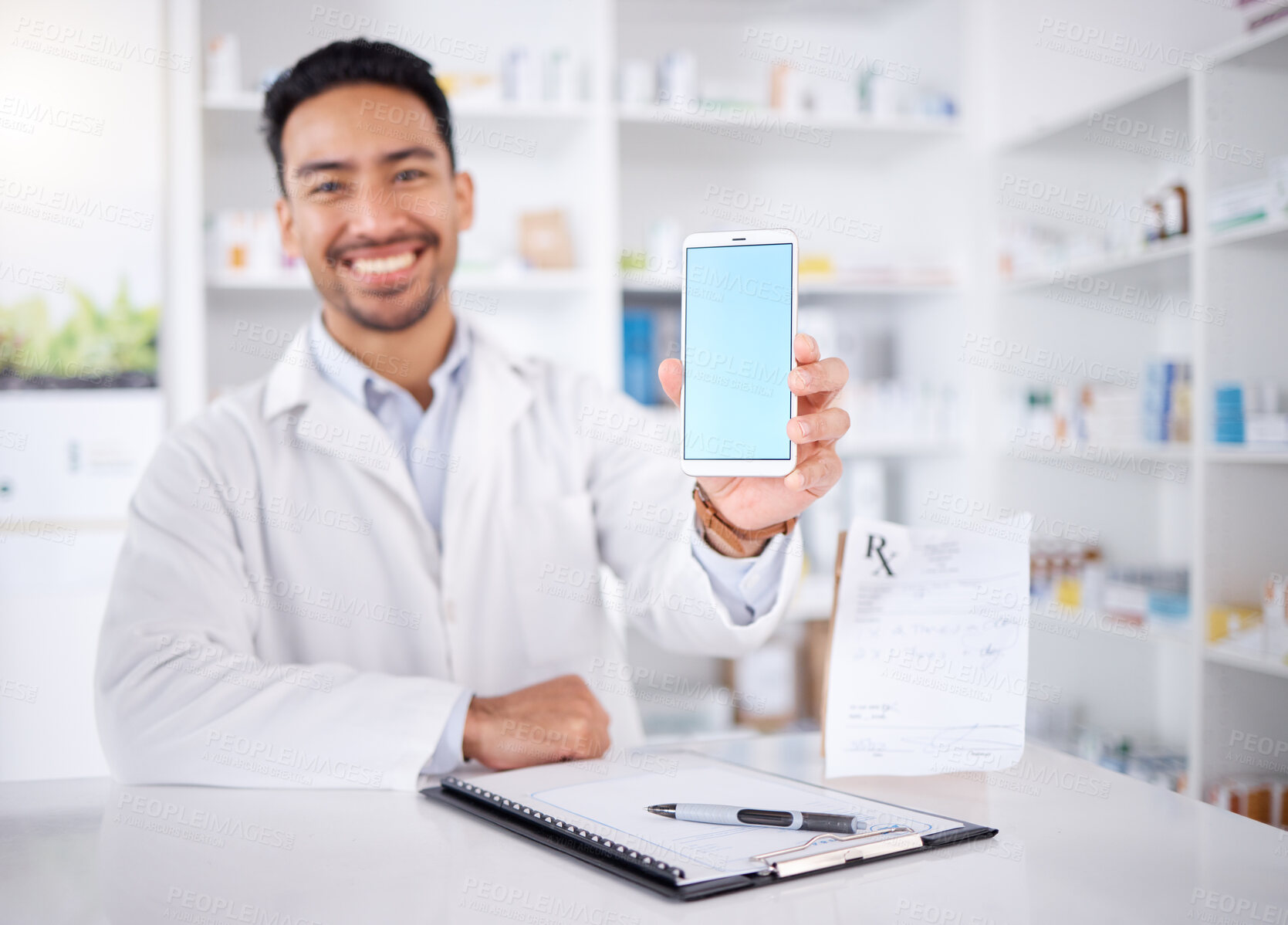 Buy stock photo Happy man, portrait and pharmacist with phone screen in pharmacy, drugstore or shop. Face, smartphone and medical professional with mockup space for healthcare promotion, advertising and marketing.