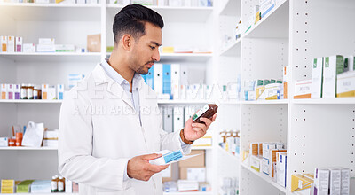Buy stock photo Pharmacist, medicine and man with bottle to check stock in pharmacy store. Medication, inventory and medical doctor reading label on pharmaceutical drugs, supplements and information for healthcare.